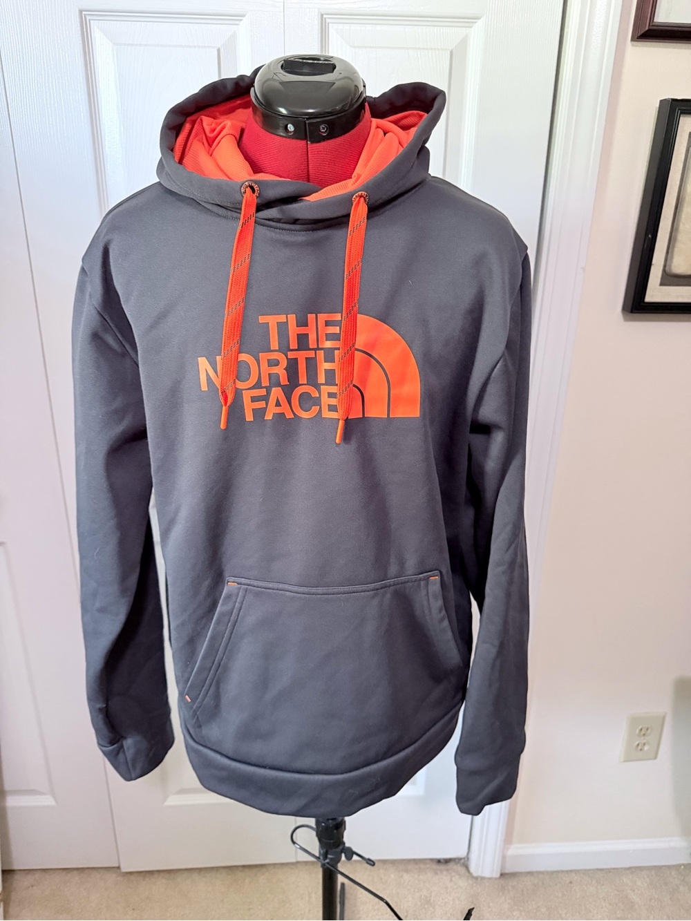 The North Face Charcoal Hoodie with Orange Logo & Lining
